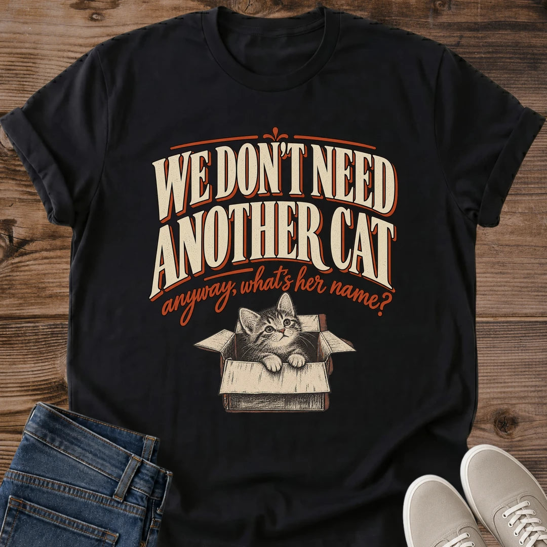 New Cat Shirt We Dont Need Another Cat Whats Her Name Graphic Tee Funny Gift Idea Ring Spun Cotton Soft Breathable Fabric Relaxed Unisex Fit Vintage Print Design Cat Person Apparel Casual Everyday Wear Statement Piece