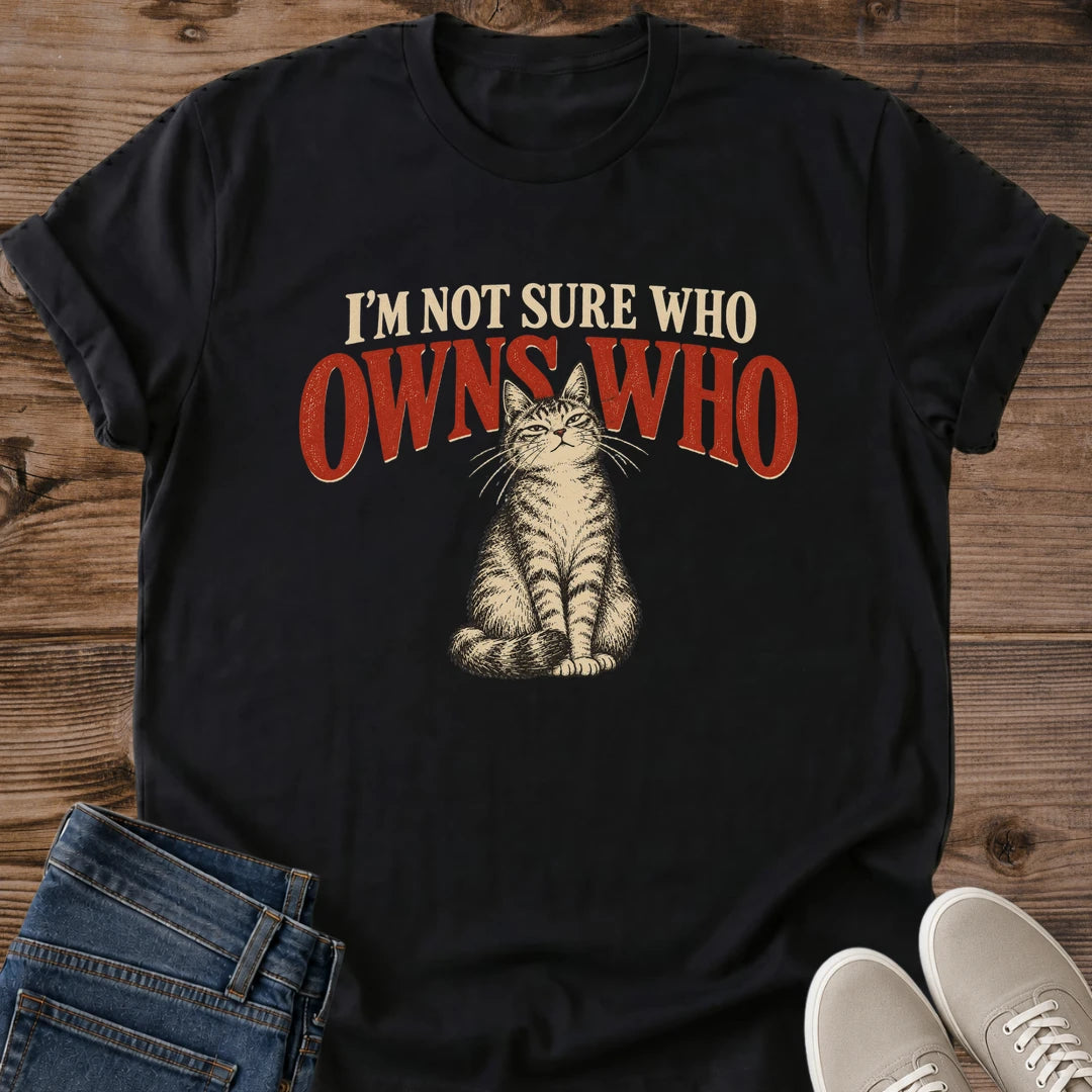 Sarcastic Cat Shirt Im Not Sure Who Owns Who Tabby Graphic Tee Funny Gift Idea Ring Spun Cotton Soft Breathable Fabric Relaxed Unisex Fit Vintage Print Design Cat Person Apparel Casual Everyday Wear Statement Piece Great Gift